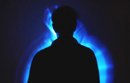 person with blue aura