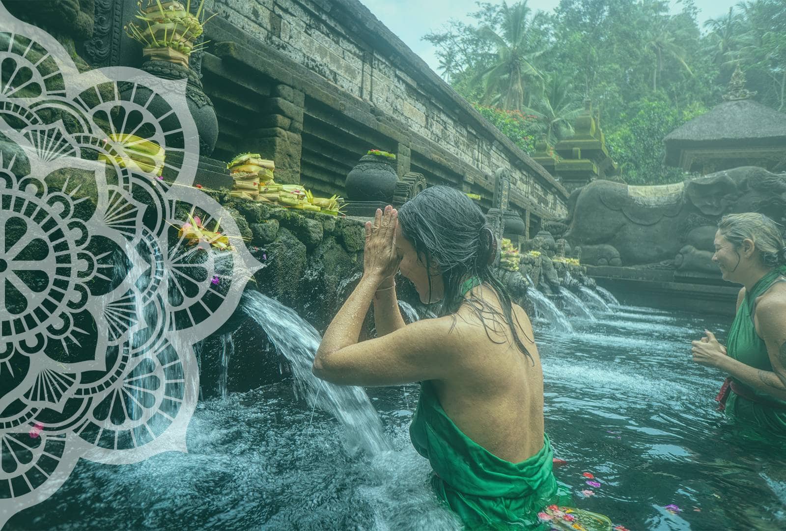 two women clearing their chakra in water at a temple