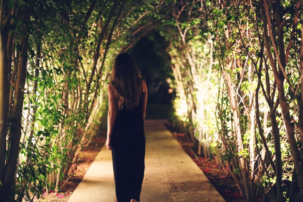 woman walking while meditating