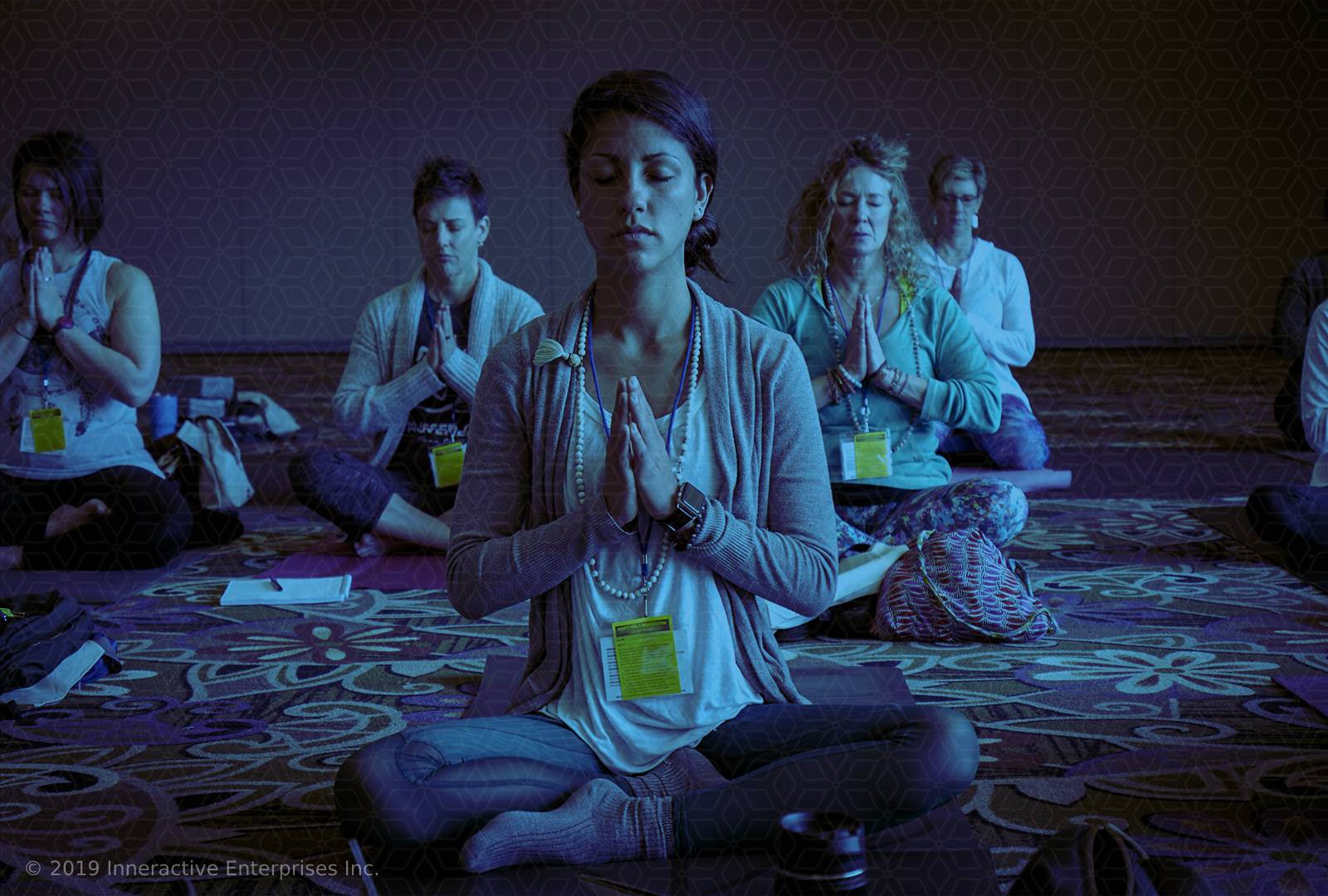 group of people meditating together